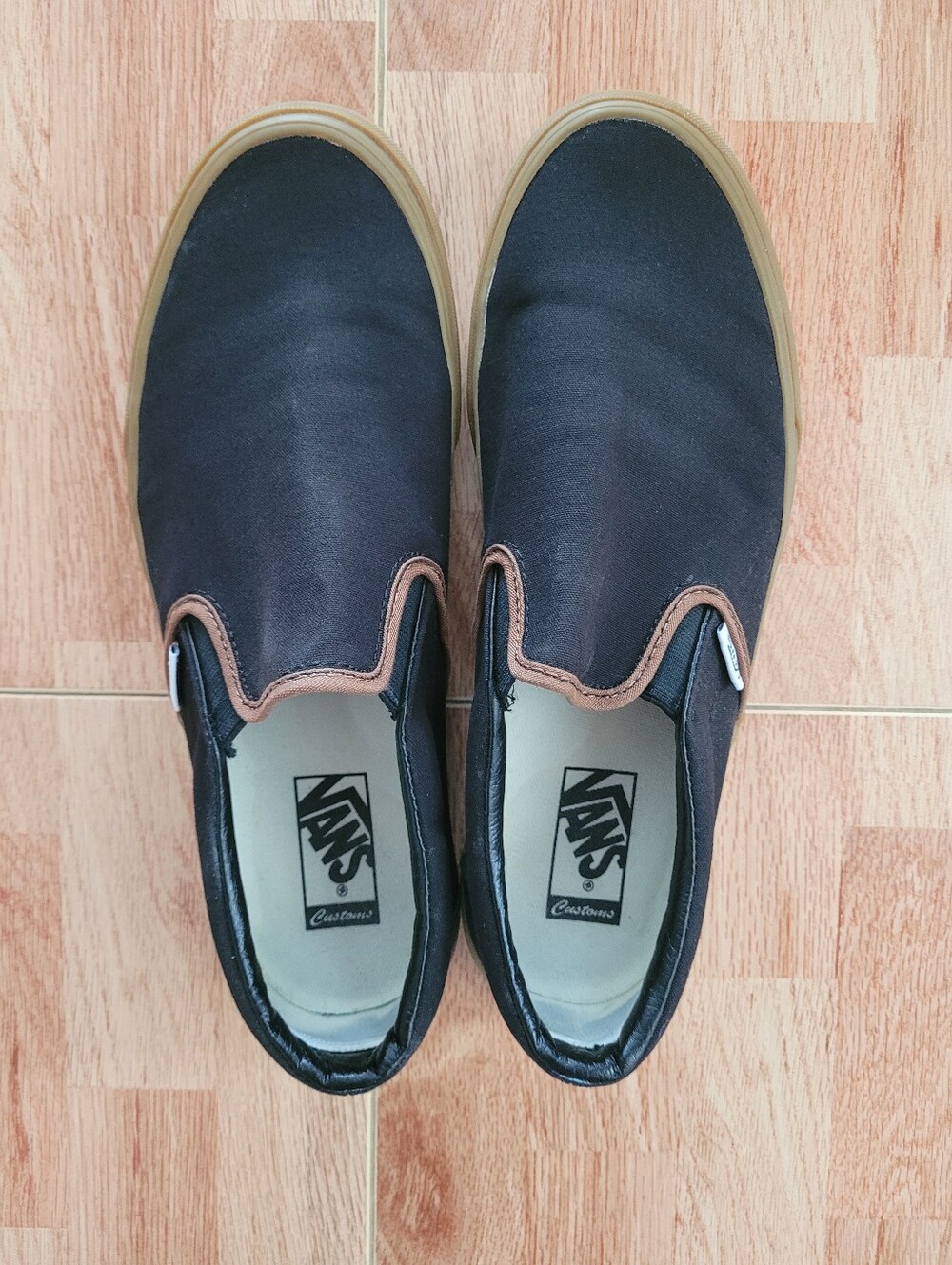 Vans Black Canvas Slip-On with Brown Trim and Gum Sole